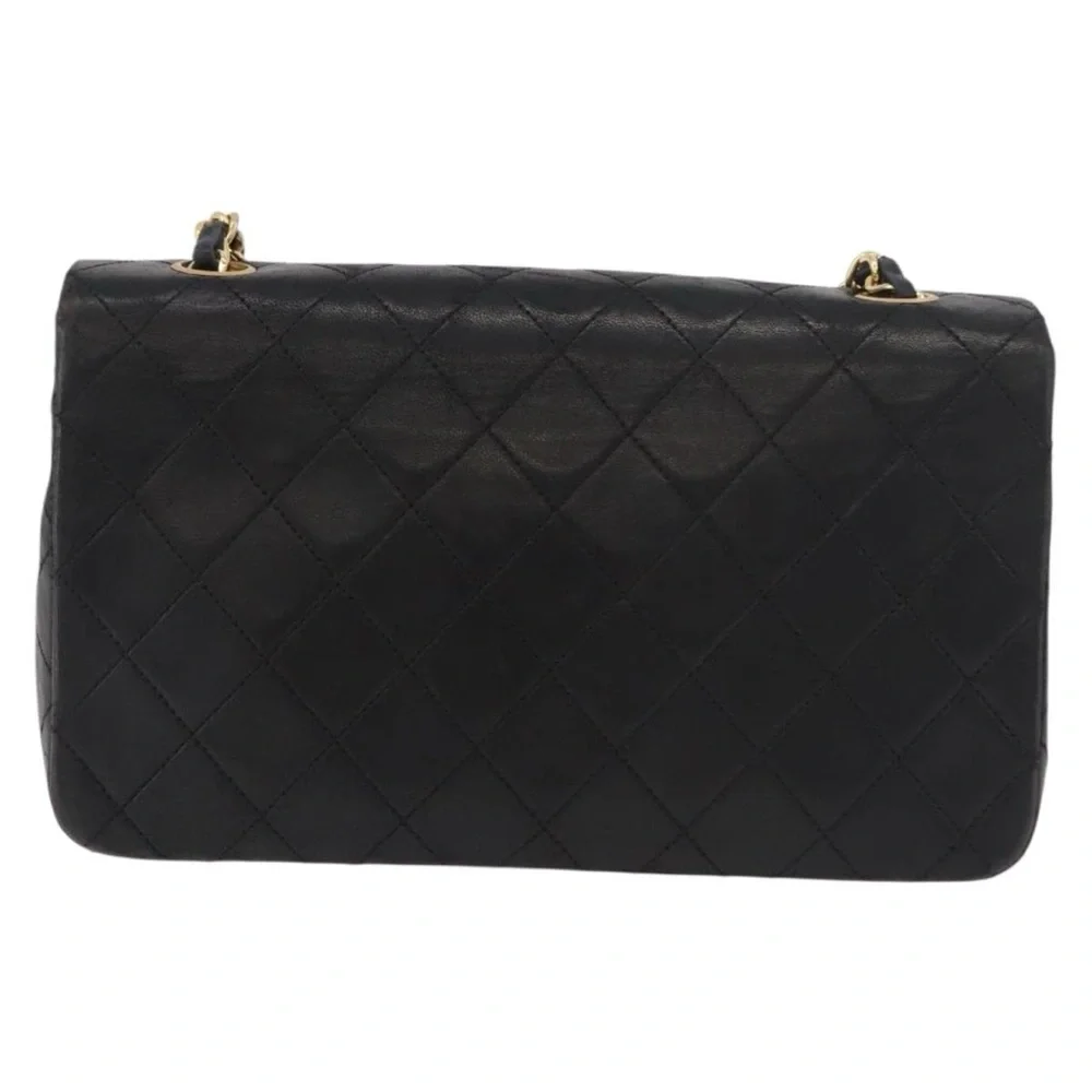 CHANEL Black Quilted Leather Shoulder Bag with Gold Hardware